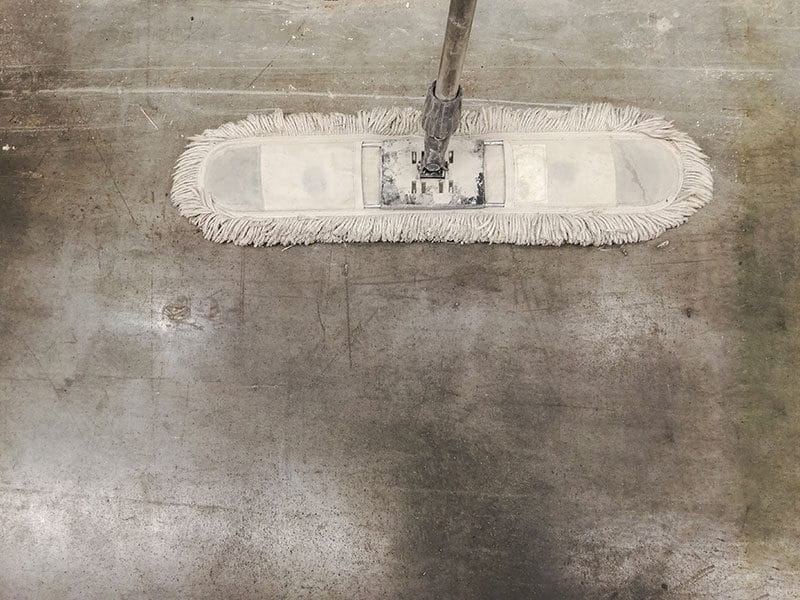 Mop on Dirty Concrete